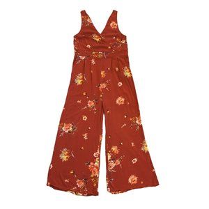 Torrid red floral surplice/wrap front jumpsuit w/ V-neck, wide legs & pockets